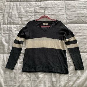 Gray and white striped v-neck sweater. Size S.